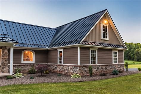 brown metal roof on brick house|homes with brown metal roofs.